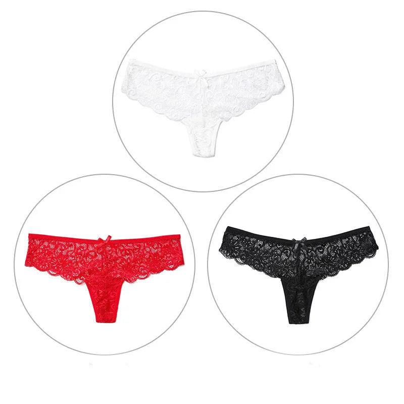 Calcinha fio dental em renda nas cores preto, vermelho e preto. Modelo sensual com laço e acabamento floral.