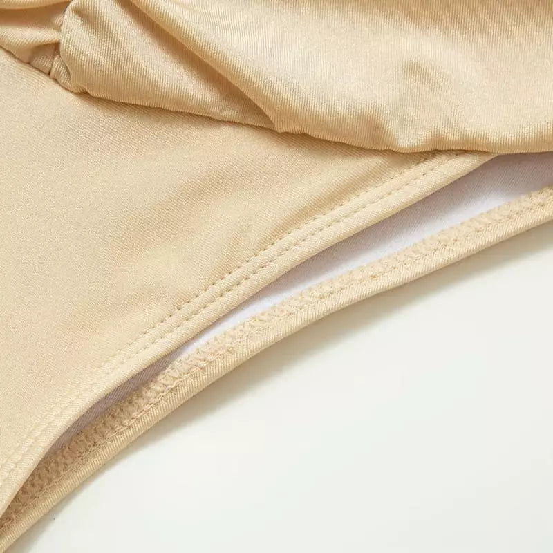 Body feminino nude com acabamento em costura dupla, tecido macio e confortável para uso diário