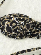 Top de biquíni com bojo estampado animal print oncinha bege, preto e branco