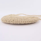 Bolsa redonda de crochê bege natural com alça longa - bolsa artesanal feminina"
