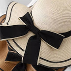 Detalhe chapéu palha bege com laço preto - acabamento bordas contrastantes feminino verãoTentar novamente