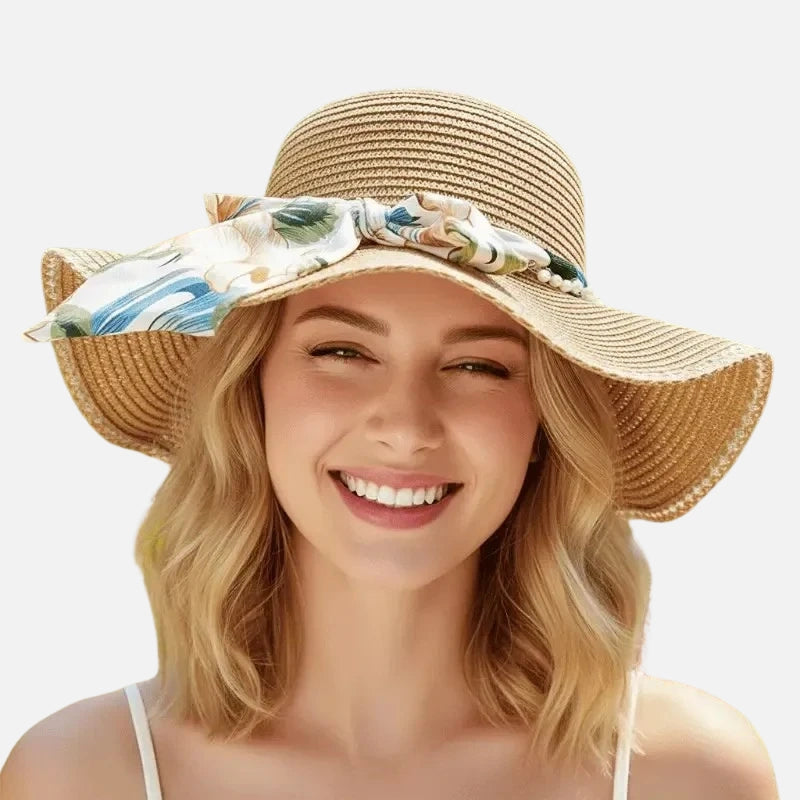 Chapéu de palha feminino com aba larga e laço floral para proteção solar e estilo verão