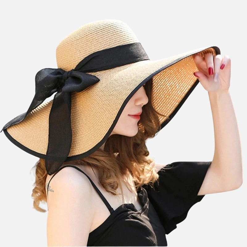 Chapéu de palha feminino com aba larga e laço preto elegante para praia e verão