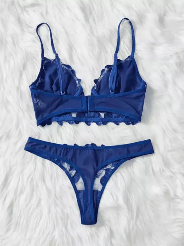 Lingerie rendada azul vista de costas 
