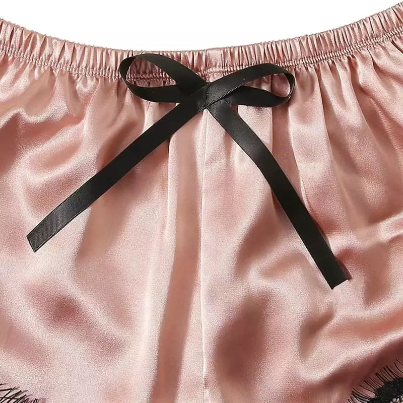 Short de cetim rosa com laço em preto