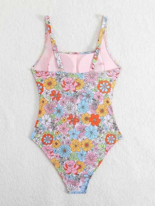 Maiô feminino florido colorido com recorte rosa no busto e alças ajustáveis finas