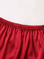 Detalhe calça pijama feminino vermelho acetinado cintura elástica confortável tecido premium