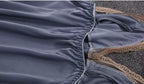 Lingerie azul acinzentada com elástico franzido e renda dourada - detalhe íntimo