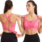 Top esportivo rosa com alças cruzadas nas costas, zíper frontal e ajuste por fivela, perfeito para fitness.