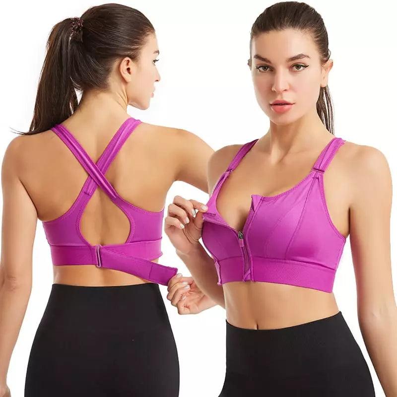 Top esportivo preto com zíper frontal, alças cruzadas nas costas e fivela ajustável, ideal para exercícios.