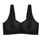A imagem mostra um sutiã esportivo preto . Ele tem um design simples e minimalista com um decote em V e alças grossas e ajustáveis